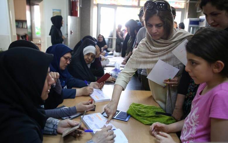 Voters cast their ballots during the presidential election in a Jewish and Christian district in the center of Tehran, Iran, May 19, 2017. TIMA via REUTERS